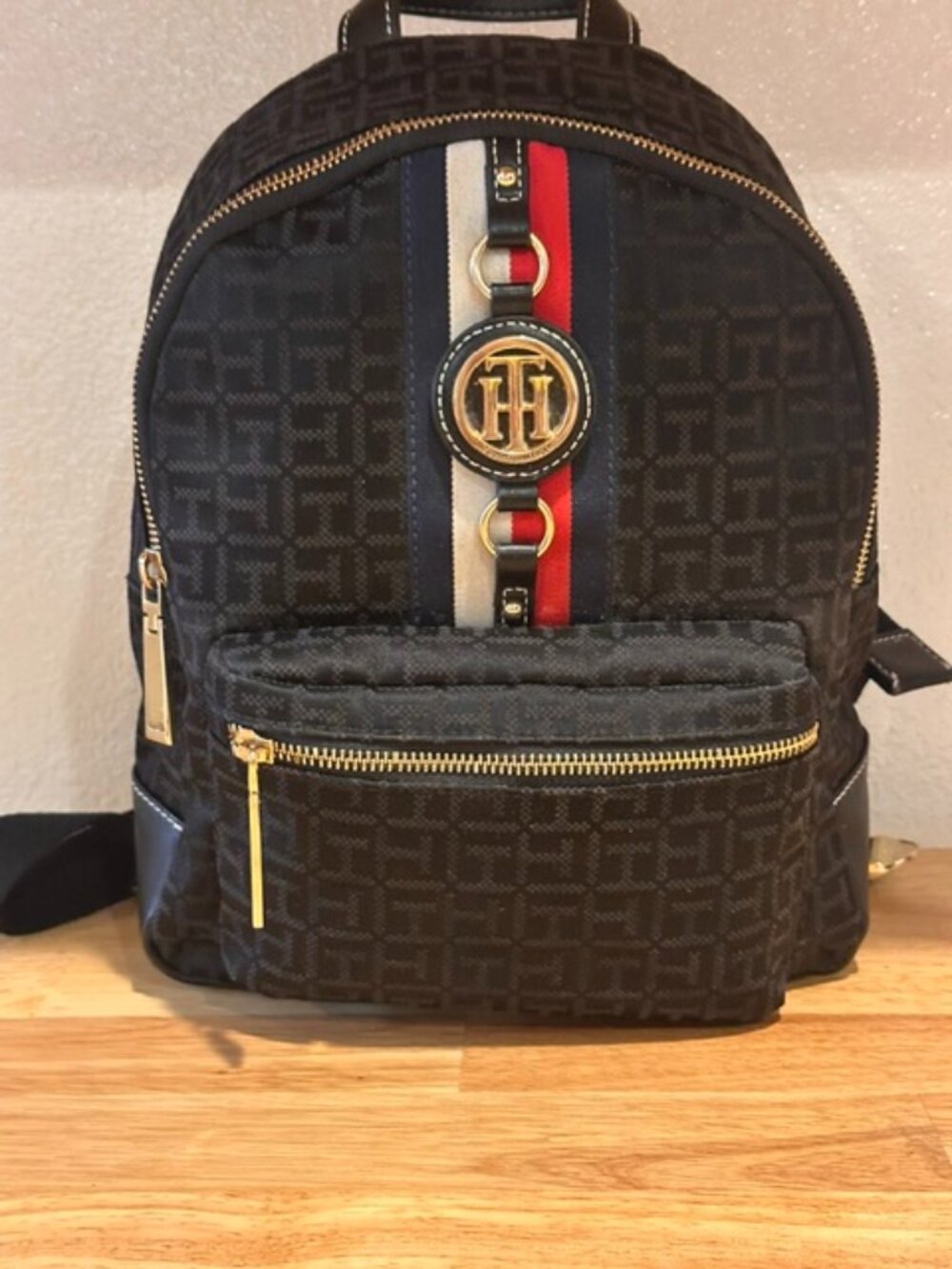 Tommy Hilfiger Small Monogram Black Jacquard Jaden Backpack w/ Gold Medallion